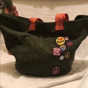 Concept One army green “piece and love” tote.